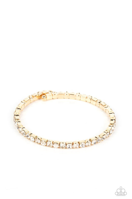 Rhinestone Spell - Gold - Paparazzi Bracelet Image
